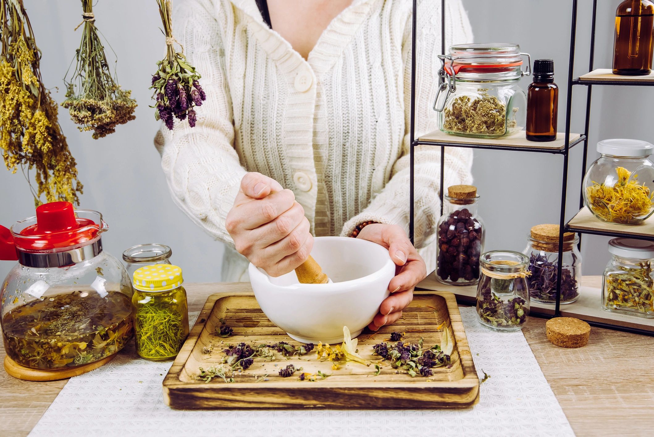 herbalist making superfood powder apothecary earthy