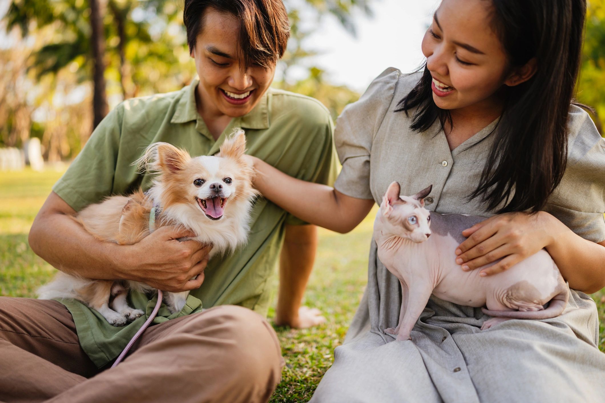 happy pet owners with animals